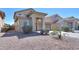 Beautiful home featuring desert landscaping, a tile roof, and a two-car garage in a desirable neighborhood at 44115 W Palmen Dr, Maricopa, AZ 85138