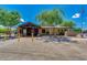 The community center features a well-maintained facade and welcoming entrance, and paved parking at 44165 W Kramer Ln, Maricopa, AZ 85138