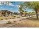 A covered picnic area overlooks the community pool and landscaped surroundings, promoting relaxation at 44165 W Kramer Ln, Maricopa, AZ 85138