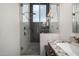 Modern bathroom featuring a large glass enclosed shower with dual shower heads at 4720 E Adobe Dr, Phoenix, AZ 85050