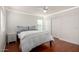 Well-lit bedroom with a bed, bedside table, and mirrored closet at 4720 E Adobe Dr, Phoenix, AZ 85050