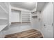 Walk-in closet with built-in shelving and drawers at 4720 E Adobe Dr, Phoenix, AZ 85050