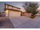 Two-story home with a well-kept yard and gravel landscaping, featuring a spacious two-car garage at 4720 E Adobe Dr, Phoenix, AZ 85050