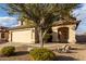 Attractive home exterior with a well-manicured yard and covered entryway, providing a welcoming feel at 4720 E Adobe Dr, Phoenix, AZ 85050