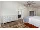 Bedroom featuring a white dresser and an ensuite bathroom at 4720 E Adobe Dr, Phoenix, AZ 85050