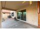 Covered patio area with access to the backyard, offering a comfortable space for outdoor seating and relaxation at 4720 E Adobe Dr, Phoenix, AZ 85050