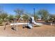 Community playground with slides, swings and climbing structure at 5114 E Hartford Ave, Scottsdale, AZ 85254