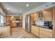 Spacious kitchen with stainless steel appliances, granite countertops and wood cabinets at 536 W Surrey Ave, Phoenix, AZ 85029