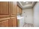 Functional laundry room with ample cabinet space and modern washer and dryer at 536 W Surrey Ave, Phoenix, AZ 85029