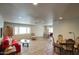 Bright living room with wood floors and an adjacent dining area at 536 W Surrey Ave, Phoenix, AZ 85029