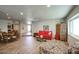 Open-concept living room with hardwood floors and bright, natural light at 536 W Surrey Ave, Phoenix, AZ 85029