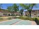 Inviting townhome community with shuffleboard courts and mature trees at 5429 N Black Cyn Hwy, Phoenix, AZ 85015