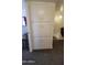 Hallway featuring built in storage and leading to staircase at 5429 N Black Cyn Hwy, Phoenix, AZ 85015