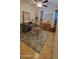 Comfortable home office with desk, shelving, and neutral-toned rug at 5429 N Black Cyn Hwy, Phoenix, AZ 85015