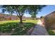 Shady community playground and green space, ideal for outdoor activities at 5429 N Black Cyn Hwy, Phoenix, AZ 85015