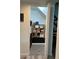 Hallway with a closet and an organized storage shelf at 5429 N Black Cyn Hwy, Phoenix, AZ 85015