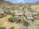 Aerial shot displays a backyard with turf, patio, mountain views, and desert vegetation at 5721 W Molly Ln, Phoenix, AZ 85083