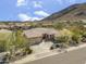 A lovely home is surrounded by beautiful desert landscape and the magnificent mountains beyond at 5721 W Molly Ln, Phoenix, AZ 85083