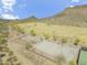 Community sports field with basketball court in a desert park setting at 5721 W Molly Ln, Phoenix, AZ 85083