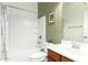 Bright bathroom features a tub-shower combo, toilet, and vanity for everyday convenience at 5721 W Molly Ln, Phoenix, AZ 85083