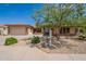 Charming single-story home featuring a well-manicured, xeriscaped yard and a two-car garage at 5721 W Molly Ln, Phoenix, AZ 85083