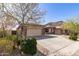 Charming single-Gathering home with a two-car garage, desert landscaping and beautiful curb appeal at 5721 W Molly Ln, Phoenix, AZ 85083