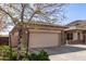 Single-Gathering home with a two-car garage, and well manicured desert landscaping at 5721 W Molly Ln, Phoenix, AZ 85083