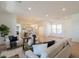 Bright living room with open layout, seamlessly connecting living, dining, and kitchen areas at 5721 W Molly Ln, Phoenix, AZ 85083