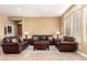 Spacious living room filled with natural light with a beautiful tile floor and fireplace at 5721 W Molly Ln, Phoenix, AZ 85083