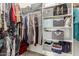 Walk-in closet featuring shelves and clothing rods for optimal organization at 5721 W Molly Ln, Phoenix, AZ 85083
