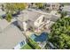 Aerial view of the property featuring a pool, a balcony and a well maintained backyard at 7745 E Calle De Las Brisas --, Scottsdale, AZ 85255