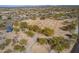 Aerial perspective of recreational spaces, tennis courts, and walking trails in a well-planned community at 7745 E Calle De Las Brisas --, Scottsdale, AZ 85255