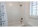 Updated bathroom featuring tiled shower-tub combo, and bronze fixtures at 7745 E Calle De Las Brisas --, Scottsdale, AZ 85255