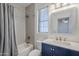 Bathroom featuring tub-shower combination and blue vanity at 7745 E Calle De Las Brisas --, Scottsdale, AZ 85255