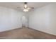 Empty bedroom with adjoining bathroom and two windows at 7745 E Calle De Las Brisas --, Scottsdale, AZ 85255