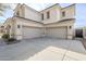 Spacious three-car garage with an expansive driveway, offering ample parking at 7745 E Calle De Las Brisas --, Scottsdale, AZ 85255
