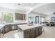This spacious kitchen includes a center island, stainless appliances, and stylish countertops at 7745 E Calle De Las Brisas --, Scottsdale, AZ 85255