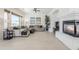 An open living room with a fireplace and comfortable seating at 7745 E Calle De Las Brisas --, Scottsdale, AZ 85255