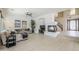 Bright living room with fireplace, staircase, and comfortable seating arrangement at 7745 E Calle De Las Brisas --, Scottsdale, AZ 85255