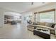 Open floor plan featuring a living room leading into the kitchen and dining area at 7745 E Calle De Las Brisas --, Scottsdale, AZ 85255