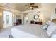 Spacious primary bedroom offers tray ceiling, neutral colors, and carpet flooring at 7745 E Calle De Las Brisas --, Scottsdale, AZ 85255