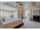 Spacious primary bedroom with recessed lighting, neutral decor, and attached bathroom area at 7745 E Calle De Las Brisas --, Scottsdale, AZ 85255