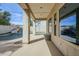 Covered patio overlooks backyard pool and landscaping, providing a relaxing outdoor space at 7745 E Calle De Las Brisas --, Scottsdale, AZ 85255