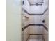 Modern tiled shower with seamless glass and built-in shelving at 7745 E Calle De Las Brisas --, Scottsdale, AZ 85255