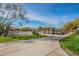 Community tennis courts with fencing and shade, offering a recreational amenity for residents at 7745 E Calle De Las Brisas --, Scottsdale, AZ 85255