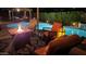 Relaxing backyard area featuring a pool, fire pit, and comfortable seating for cozy evenings at 7800 E Via Del Futuro E --, Scottsdale, AZ 85258