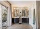 Bathroom featuring dual vanities, modern fixtures, and a sliding door to patio at 7800 E Via Del Futuro E --, Scottsdale, AZ 85258