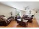 Inviting living room featuring hardwood floors, a fireplace, and ample seating space at 7800 E Via Del Futuro E --, Scottsdale, AZ 85258