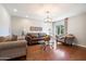 Bright living room with hardwood floors, neutral walls, and comfortable seating arrangement at 7800 E Via Del Futuro E --, Scottsdale, AZ 85258