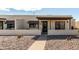 Charming townhome featuring a private entryway and desert landscaping at 849 E Lancaster Cir, Florence, AZ 85132